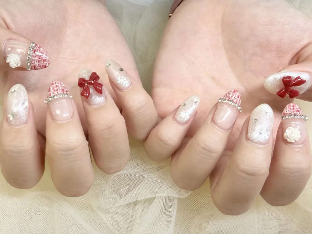 ツイード×赤リボンネイル