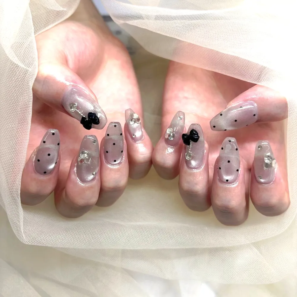 黒リボンドットクリアネイル